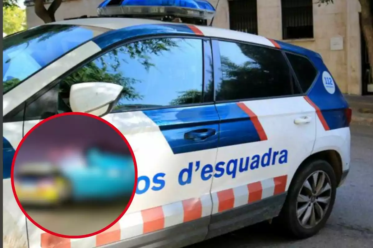 Un coche de los Mossos d'Esquadra con un círculo rojo resaltando un área borrosa.