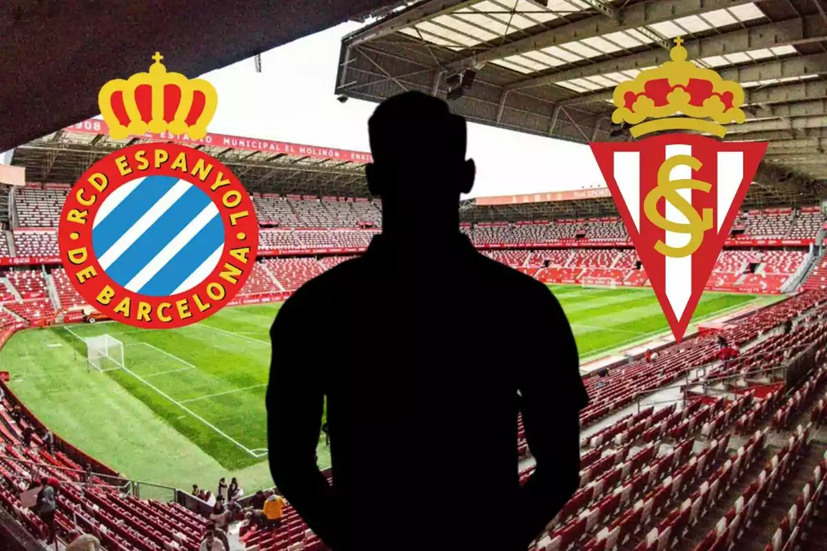 Una silueta de una persona en un estadio de fútbol con los escudos del RCD Espanyol de Barcelona y el Sporting de Gijón.