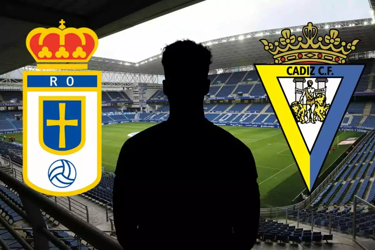 Una silueta de una persona en un estadio de fútbol con los escudos de los equipos Real Oviedo y Cádiz C.F.