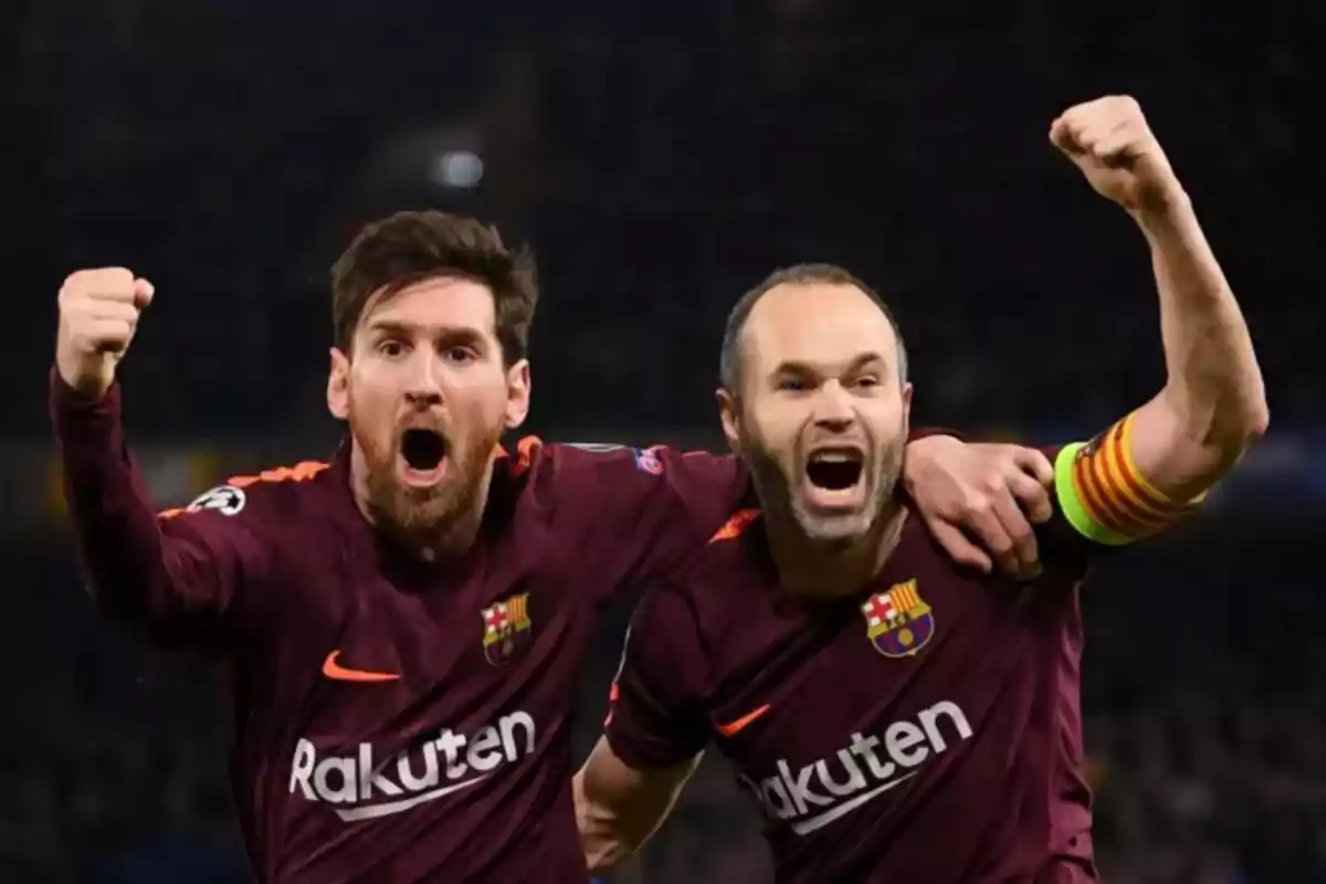 Andrés Iniesta y Leo Messi celebrando un gol