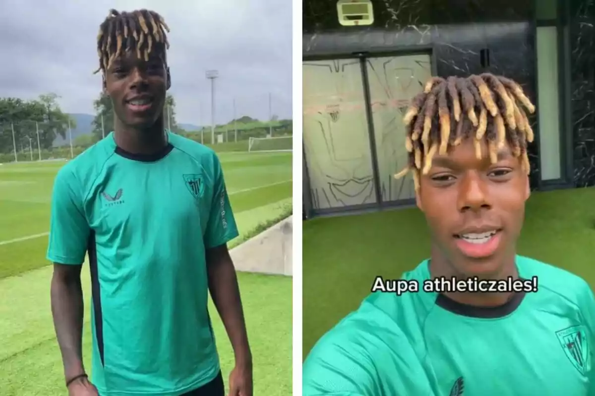 Un jugador de fútbol con una camiseta verde del Athletic Club sonríe en un campo de entrenamiento.