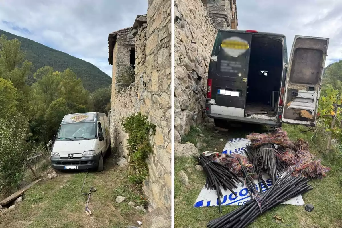 Una furgoneta blanca y otra negra están estacionadas junto a una pared de piedra en un entorno rural; hay cables robados en el suelo cerca de la furgoneta negra.