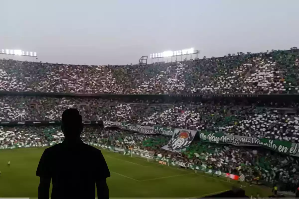 Montage con el Estadio del Real Betis, el Benito Villamarín, y una sombra negra en la parte inferior izquierda